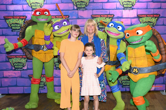 Linda Robson and grandchildren Betsy and Lyla attend the launch the new Teenage Mutant Ninja Turtles Mutant Mayhem movie toy range from Character Options