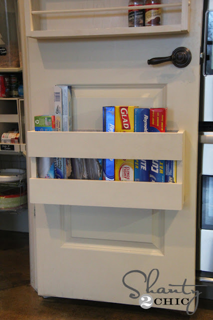 Utilize the back of a pantry door for kitchen supplies