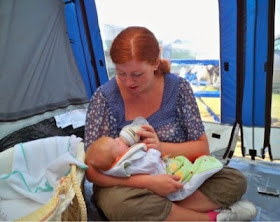 Our top tips on how to camp with a baby and keep them warm at night.
