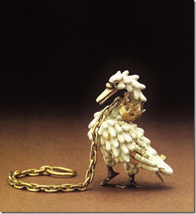 The Dunstable Swan Jewel. Opaque white enamel over gold. Probably made by a london goldsmith. c. 1400. (from the book: Medieval Craftsmen Goldsmiths by John Cherry.