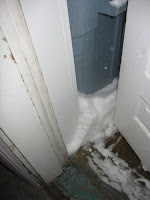 The side door that goes out to the deck. Hubby put the trash cans up by the door, but we can't get into them anyway