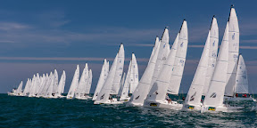 J/70 one-design sailboats- sailing off start- Key West Race Week