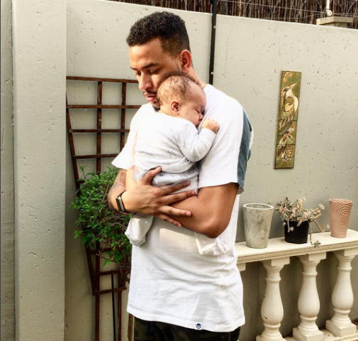 Rapper AKA with his daughter.