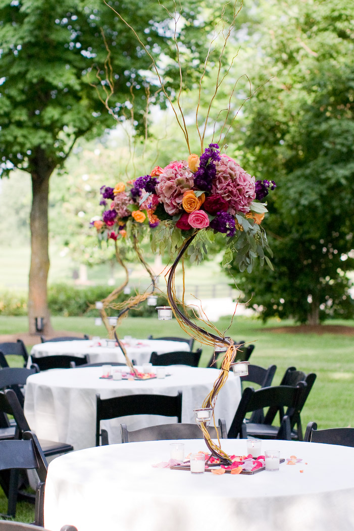  along with votive candles black chairs and white linen tablecloths