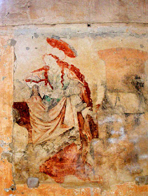 14C wall painting of Mary Magdalene in the church of Saint Maurice la Clouere. France. Photographed by Susan Walter. Tour the Loire Valley with a classic car and a private guide.