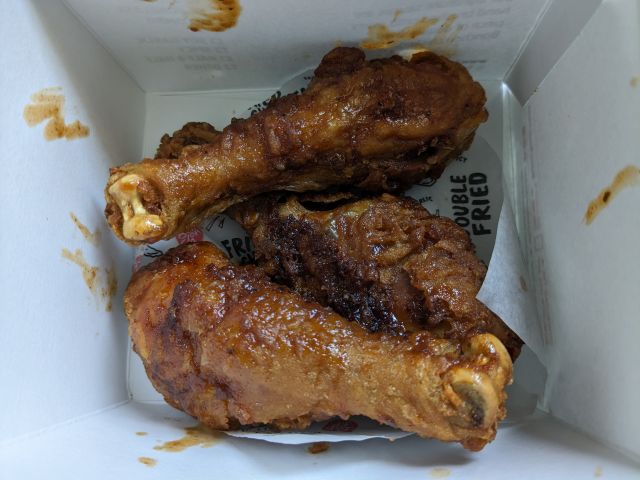 Bonchon Korean BBQ Sauce Fried Chicken in a box.