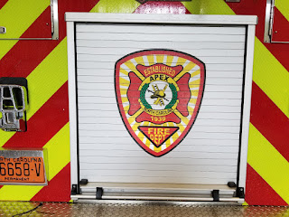 Apex firetruck with badge on the back