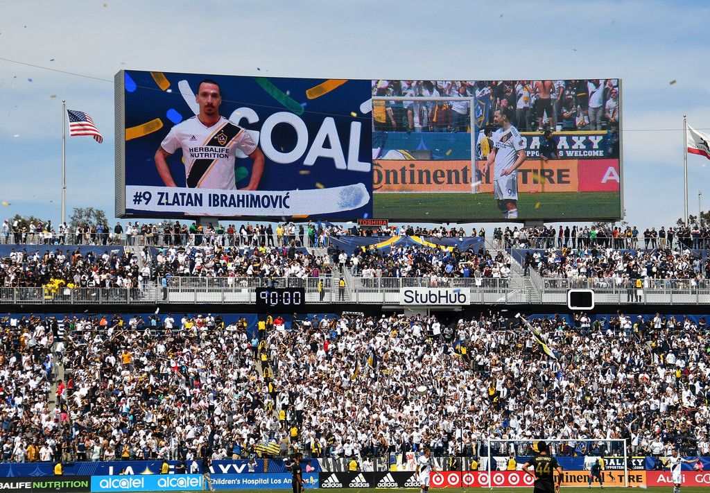 Fans celebrates after a goal by Zlatan Ibrahimovic #9 of Los Angeles Galaxy in the second half of the game against the Los Angeles FC as at StubHub Center on March 31, 2018 in Carson, California