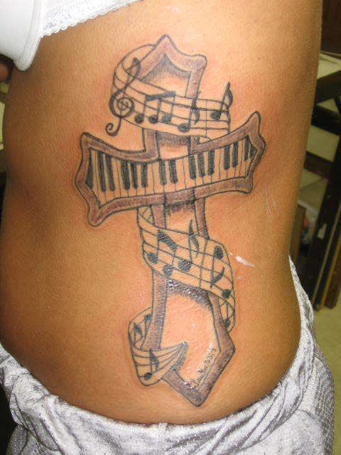 Memorial Cross Tattoos. music cross tattoo,