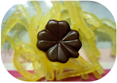 Praline chocolat noir, praliné noisette et citrons confits
