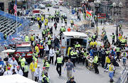 photo by Charles Krupa/AP Blasts Rock Boston Marathon; 2 Dead, . (boston explosion)