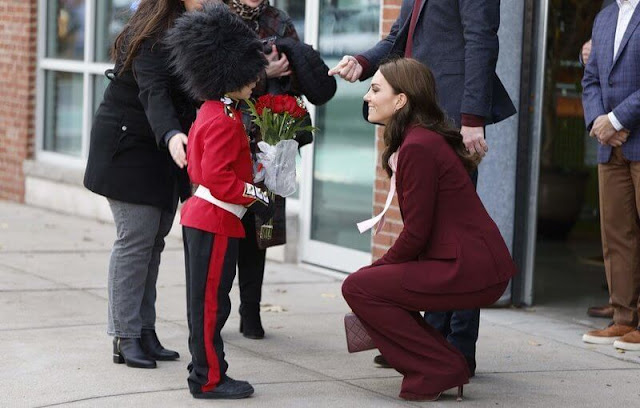 The Princess of Wales wore a sleek burgundy suit by Alexander McQueen and pale pink bow blouse