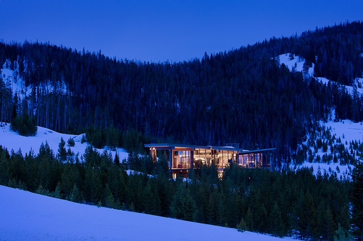 Elegant Mountain Home by Reid Smith Architects at night