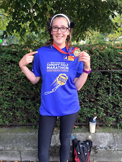 Mandi Brooks with my medal and T-Shirt at the Cardiff Half Marathon