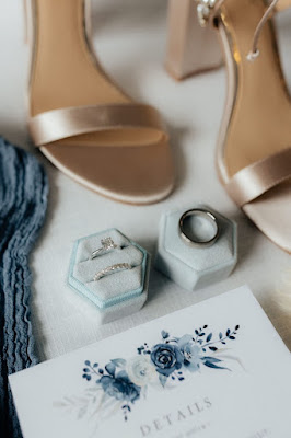 wedding invitation with bridal shoes and rings