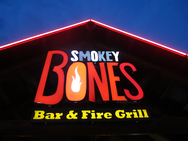 Sign out front of Smokey Bones Bar & Fire Grill in Tyngsboro, MA