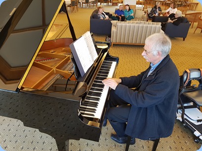 Claude Moffat playing the Kohler grand piano