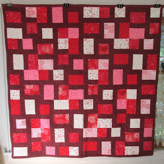 Red and white quilt
