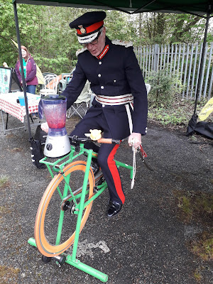 The Lord Lieutenant of Merseyside making a bicycle-powered smoothie