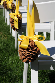 Pine cone aisle makers by Take the Cake Events