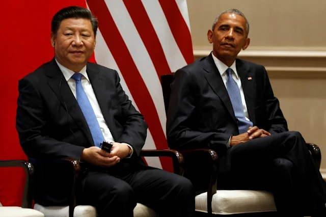 Image Attribute: China's President Xi Jinping (L) and U.S. President Barack Obama participate in a Paris Agreements climate event ahead of the G20 Summit, at West Lake State Guest House in Hangzhou, China September 3, 2016. REUTERS/Jonathan Ernst