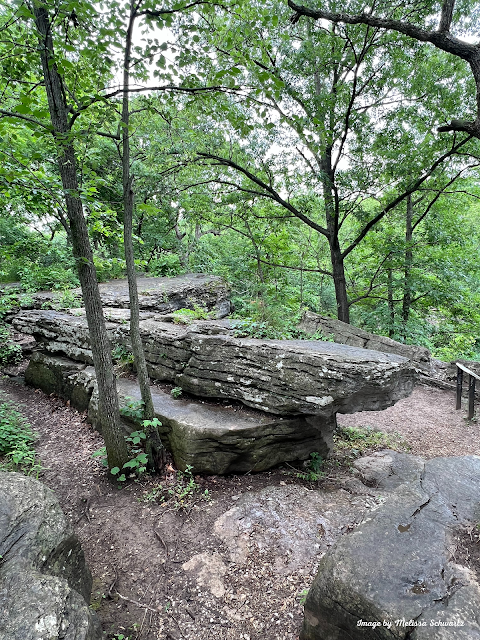 Blocks of nature-sculpted limestone create an intriguing landscape in the woodlands of Swope Park.