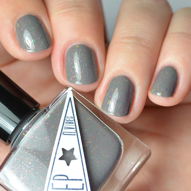 grey nail polish with flakies and shimmer