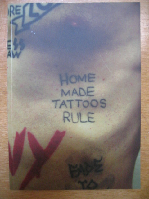 Home Made Tattoos Rule. It's a book by a dude named tom (Thomas Jeppe to be 