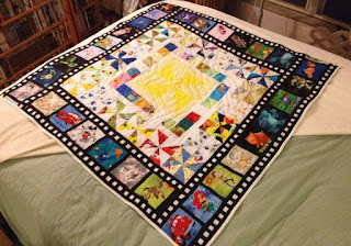 Disney filmstrip-themed baby quilt