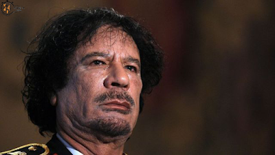 How did Muammar Gaddafi