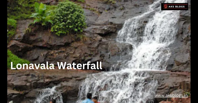Mesmerizing waterfall in Lonavala surrounded by lush vegetation and misty atmosphere.