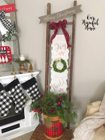 farmhouse living room mantel Christmas decor shiplap sign buffalo check stocking