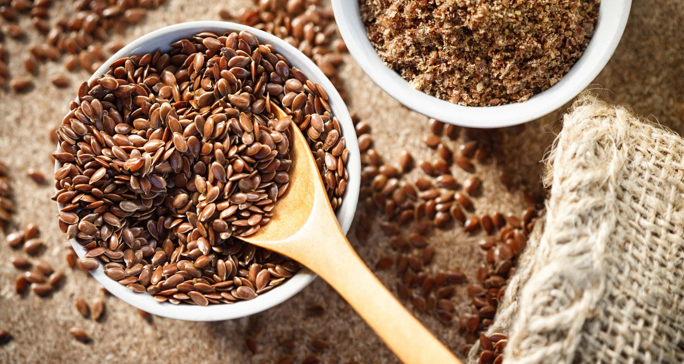 bowl of seeds and bowl of ground seeds