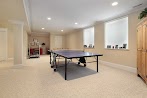 Images Basement Remodels : Basement Remodeling Smartland Residential Contractors / Neutral basement features a sectional and wood accents.