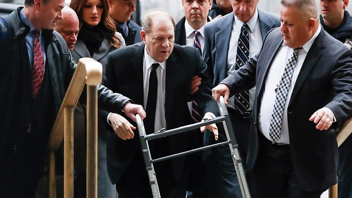 Weinstein using a walker