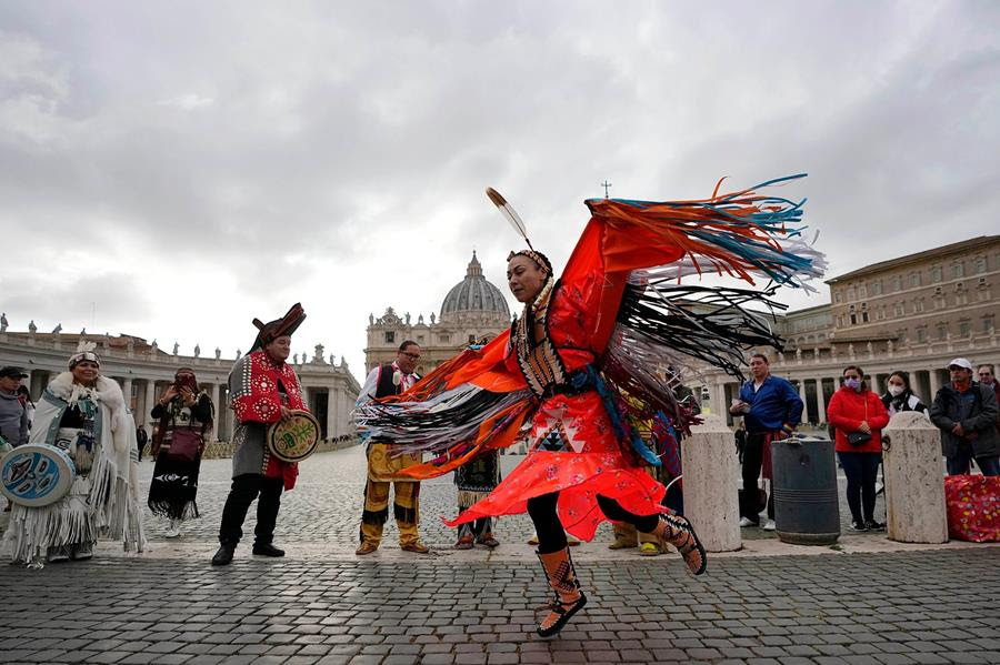 Members of the Assembly of First Nations perform in St. Peter's Square at the Vatican.