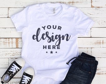 Download White Bella Canvas 3001 Kids Tshirt Mockup With Shorts and Shoes On Distressed Wood Background ...