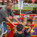 Don Eason shows his 3-year-old twin sons the fireworks he just purchased at a stand in Newburgh, N.Y.