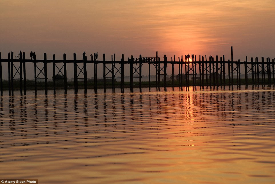 Spanning nearly a miles across the Taungthaman Lake in Myanmar, the U-Bein Bridge is a rickety platform made of teakwood. The bridge is held together on both sides with 1,086 pillars that come up out of