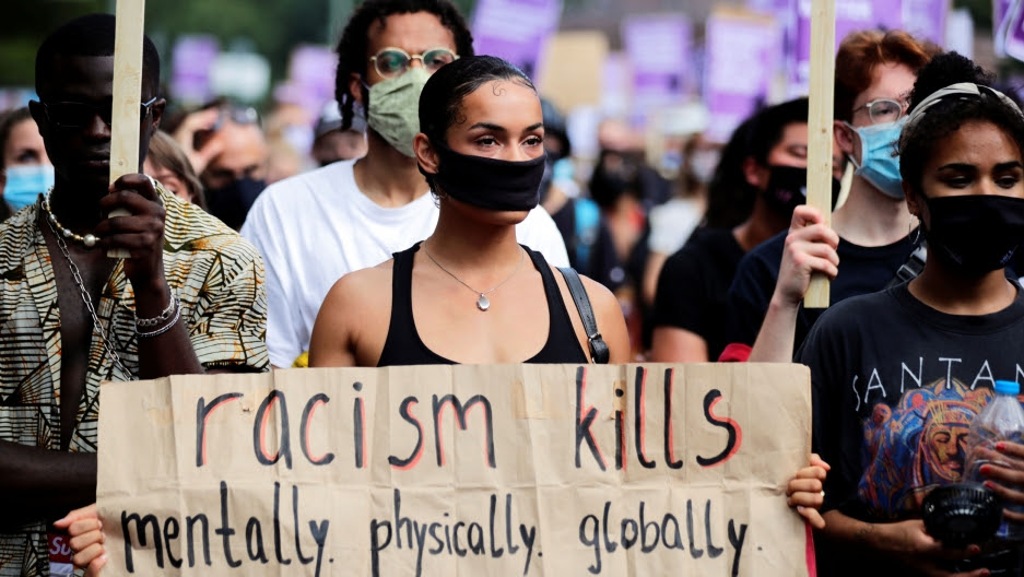 People take part in a Black Lives Matter demonstration in Berlin, July 18, 2020.