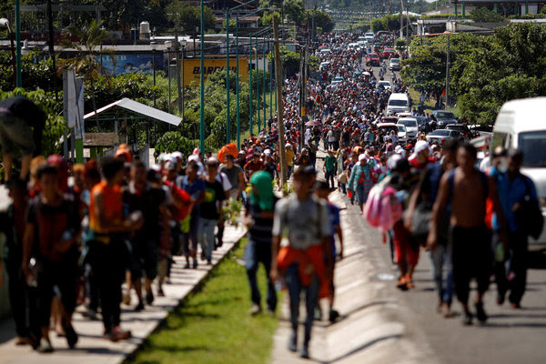 Migrants walking north from Tapachula, Mexico, on Sunday. Thousands have <a href=â€https://www.nytimes.com/2018/10/20/world/americas/migrants-caravan-mexico.htmlâ€>defied orders from the Mexican authorities</a> to register.
