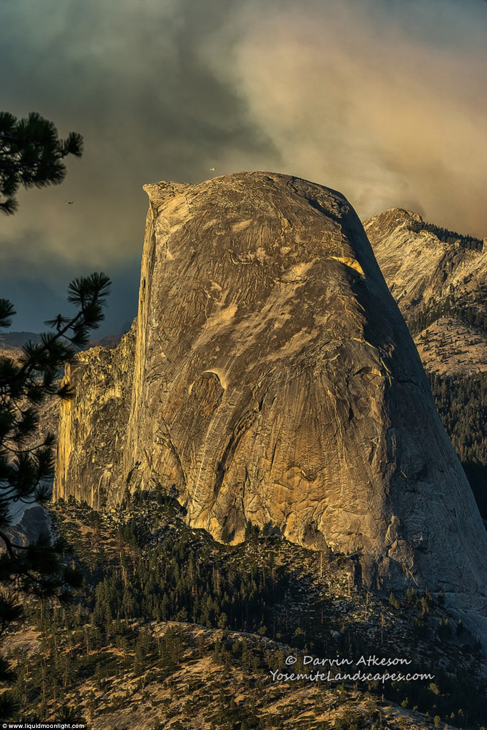 Helicopter rescue: Hikers being evacuated off the park's iconic Half Dome peak, which rises nearly 5,000ft above Yosemite Valley