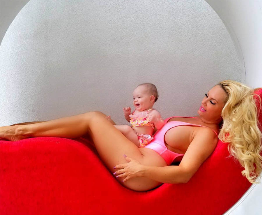 Coco Austin shows lots side boob in a new swim suit