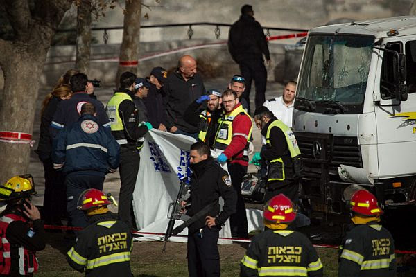 The scene where a truck rammed into a group of Israeli soldiers, killing at least four, in the Armon HaNatsiv neighborhood of Jerusalem. At least 15 more people were injured in the terrorist attack. January 08, 2017.