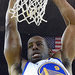 The Warriors' Andre Iguodala, who scored 15 points, dunking against the Cavaliers' Tristan Thompson, left, and James Jones, right, in the first half.