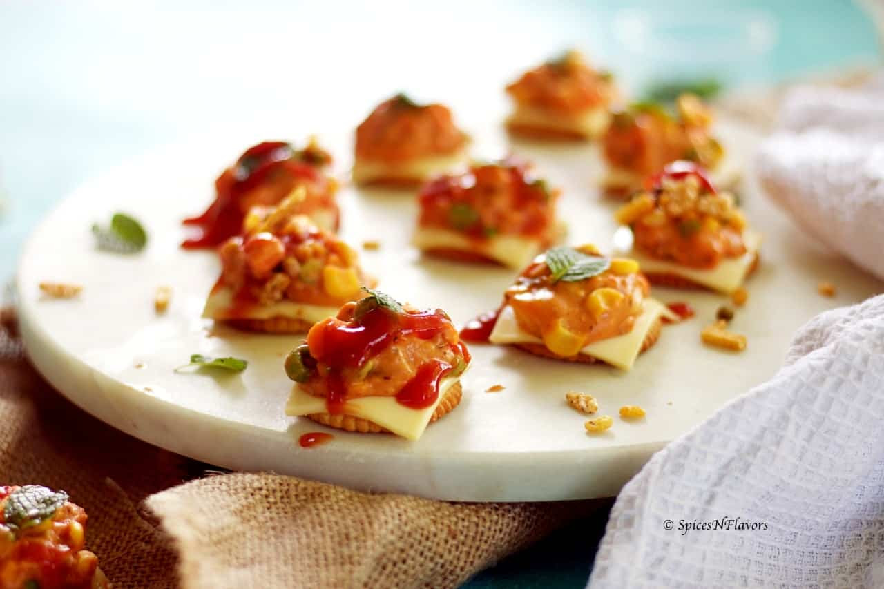 Blue corn tortilla chips, jalapeno pepper, roquefort cheese, avocados and 3 more. Cheesy Monaco Bites Monaco Biscuit Party Topping Spices N Flavors