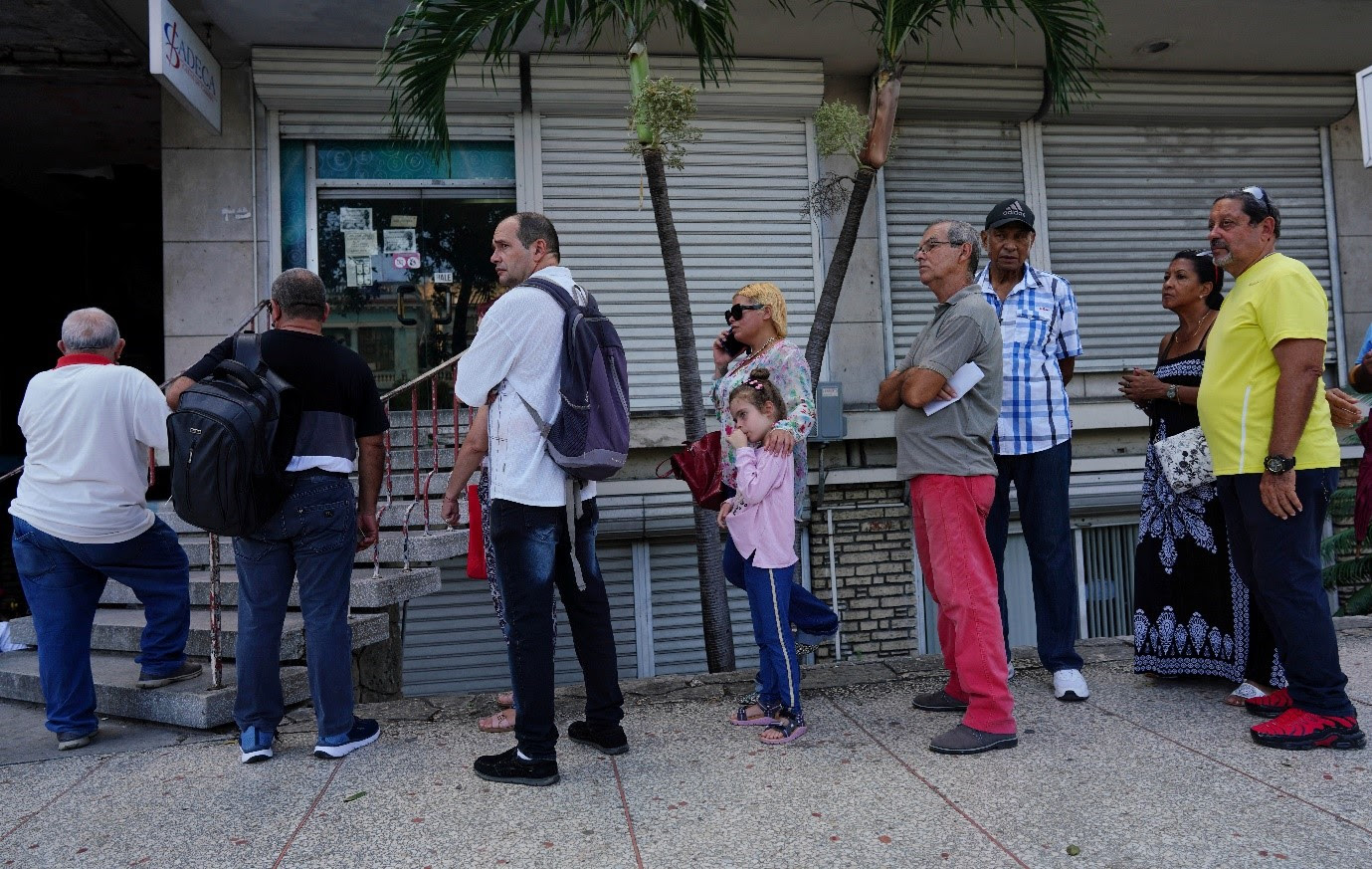 Cubans struggle as peso loses half its value in a year.