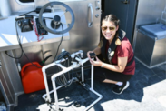 An intern with the NOAA Chesapeake Bay Office readies equipment to monitor the health of restored oyster reefs