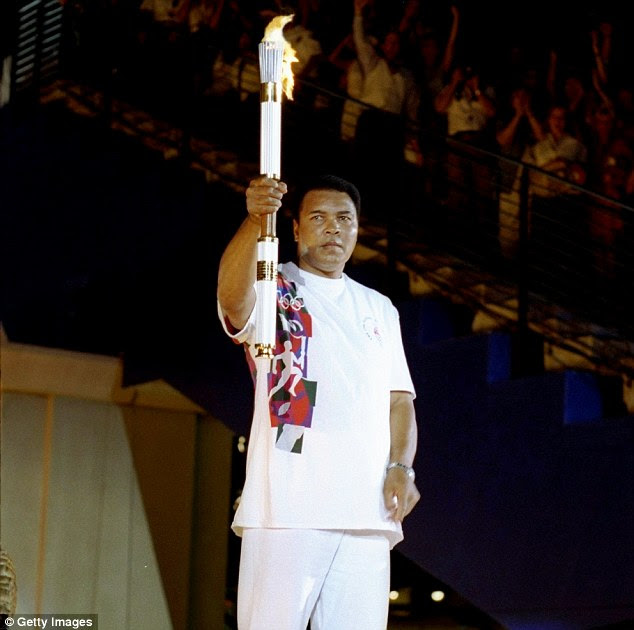 His life was chaotic and challenging, made more challenging when Parkinson's ravaged him physically. The Olympic gold medalist holds the torch before lighting the Olympic Flame at the 1996 Atlanta games, already struggling with the disease