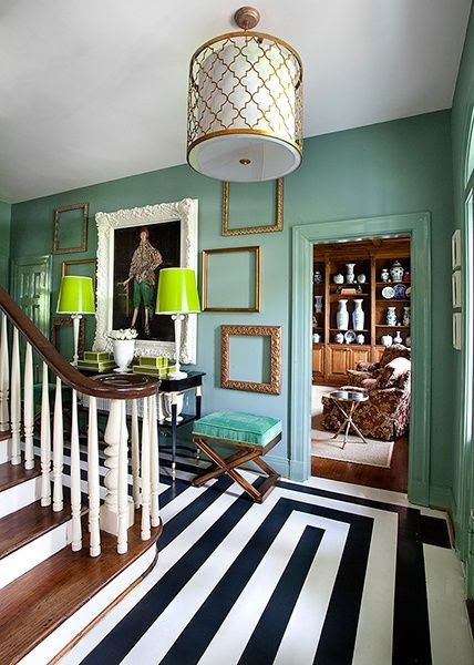 Love the combination of wood, black and white, gold with the mint walls. Like that the trims are painted the same color as the walls. Lime green accent.